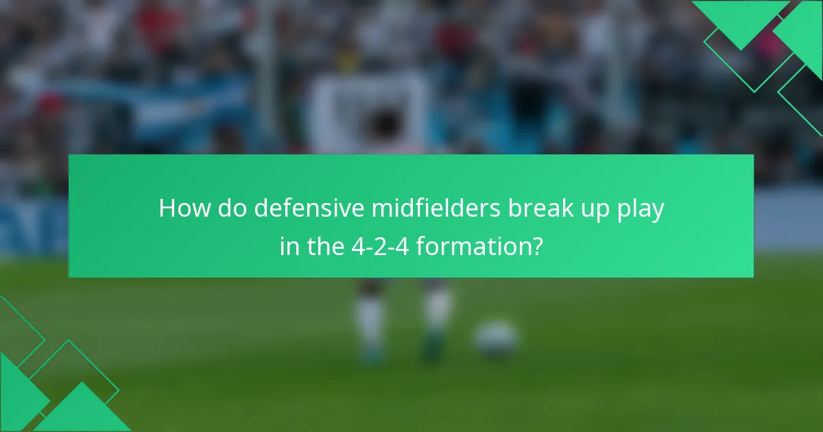 How do defensive midfielders break up play in the 4-2-4 formation?